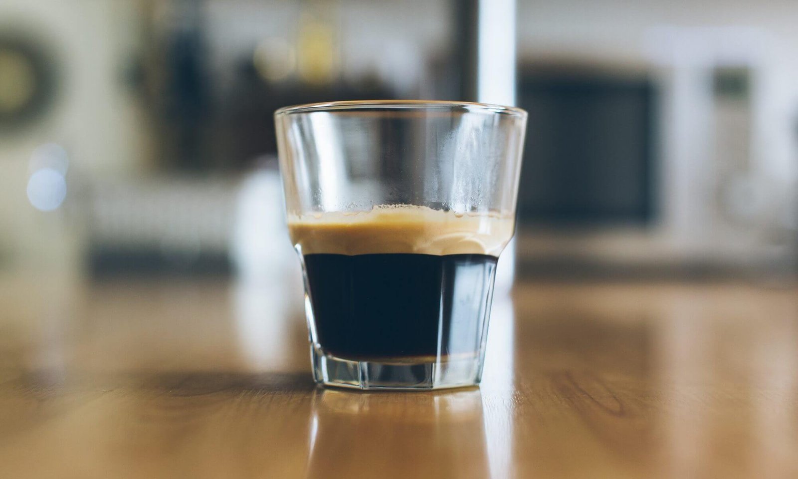An espresso in a small white cup